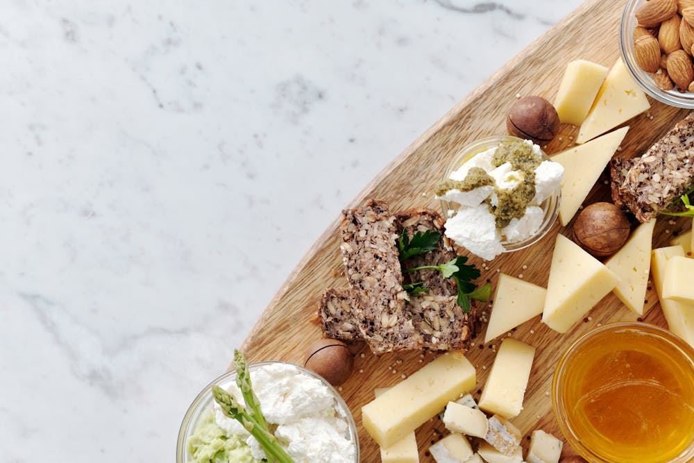 Marble serving slab with a charcuterie spread